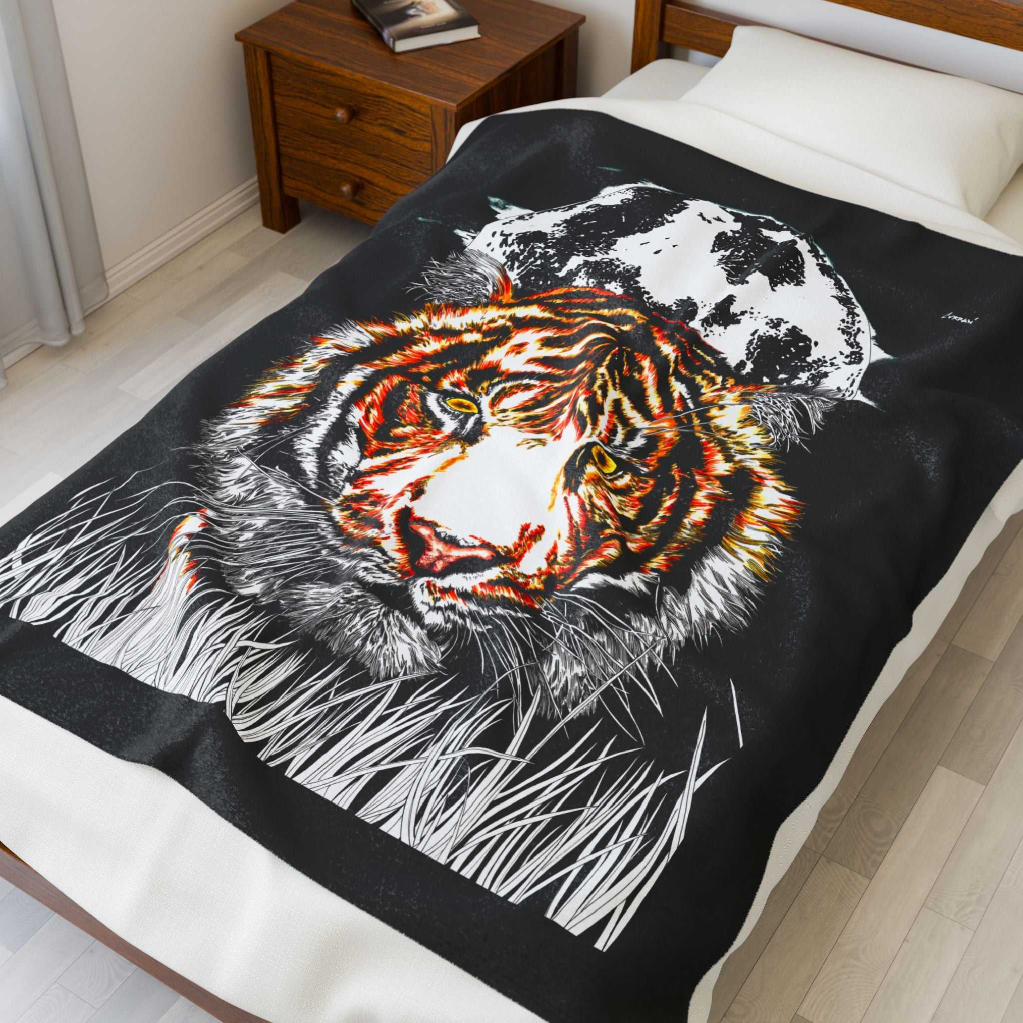 Majestic tiger artwork blanket featuring vibrant colors and a striking design on plush fabric.