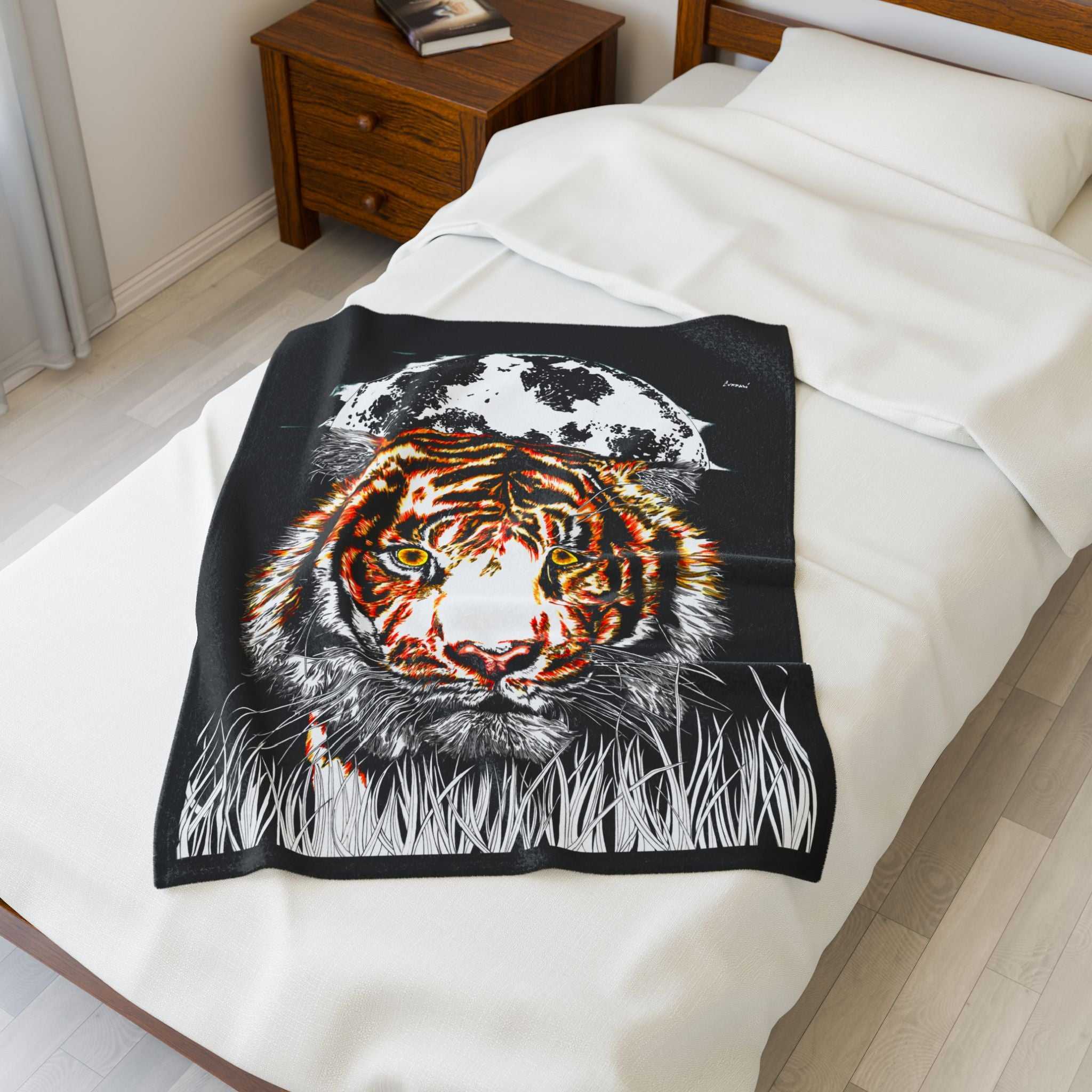Majestic tiger velveteen plush blanket on a bed, adding cozy home decor with striking design.