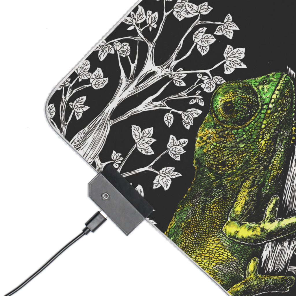 Chameleon LED gaming mouse pad with vibrant colors and dynamic RGB lighting for an enhanced gaming experience.